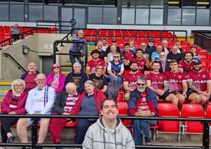 A group of beneficiaries from Wigan Warriors