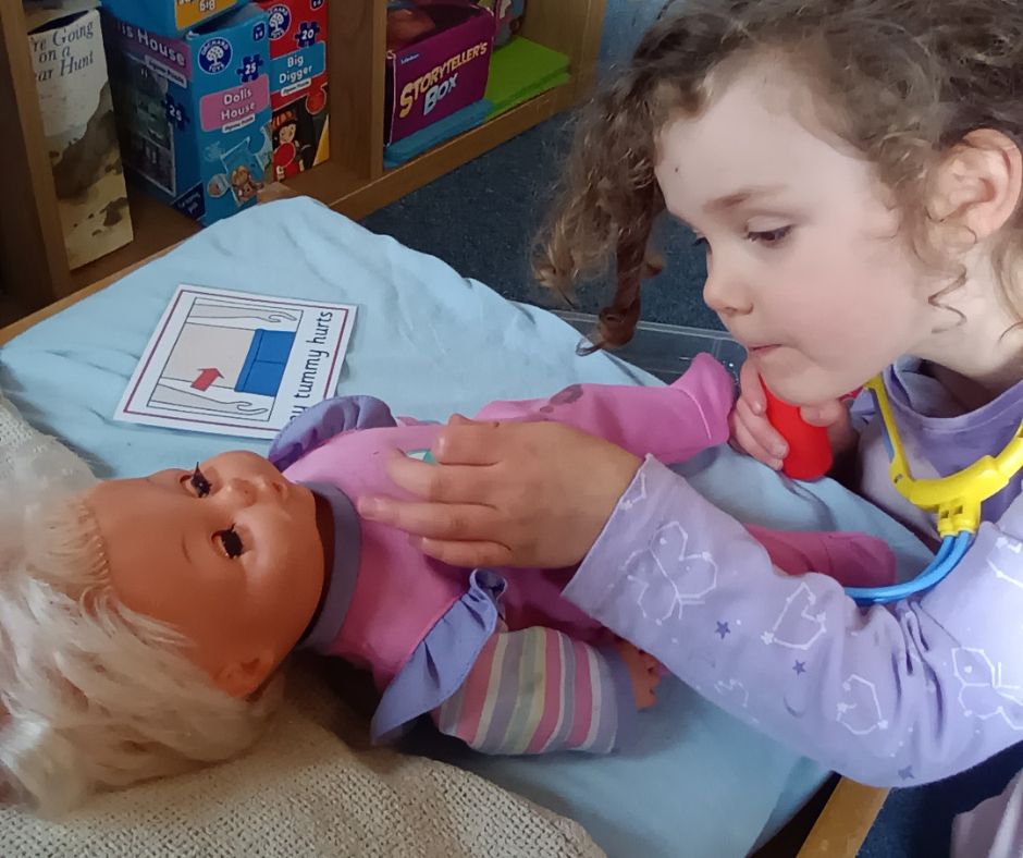 Child beneficiary playing with toy